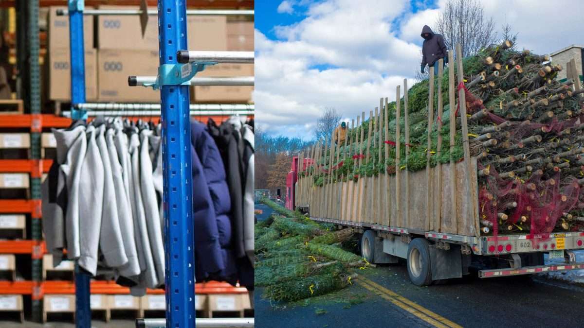 Jackets hang on a rack in a warehouse, surrounded by boxes. Nearby, a person stands atop a truck loaded with bundled Christmas trees, situated on a road with overcast skies.