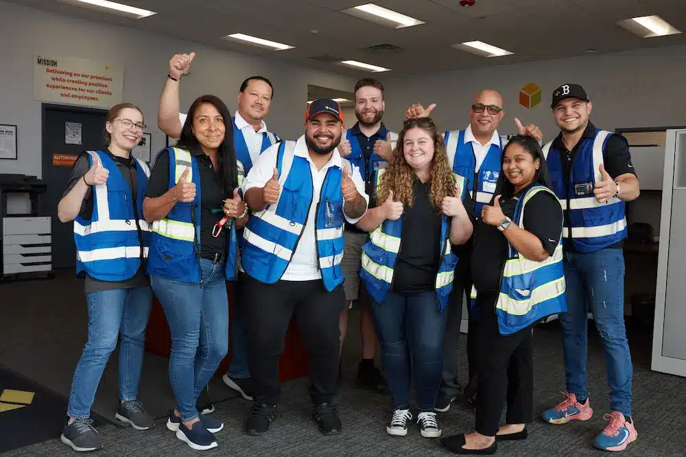 Boxzooka client success team celebrating together, representing partnership, hands-on support, and commitment to helping brands scale fulfillment.