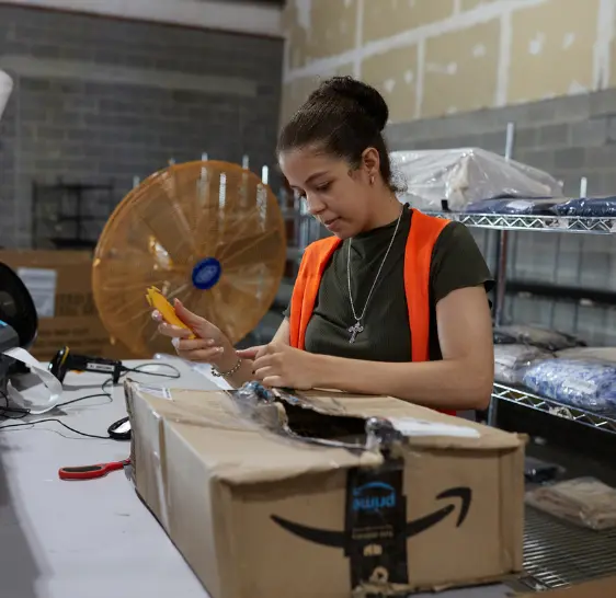 Warehouse associate packing an order