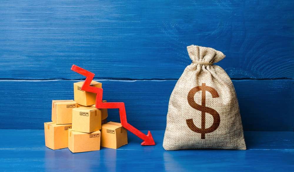 Dollar money bag with boxes and down arrow. Income decrease, slowdown and decline of economy. Bad consumer sentiment and demand for goods. Low sales.