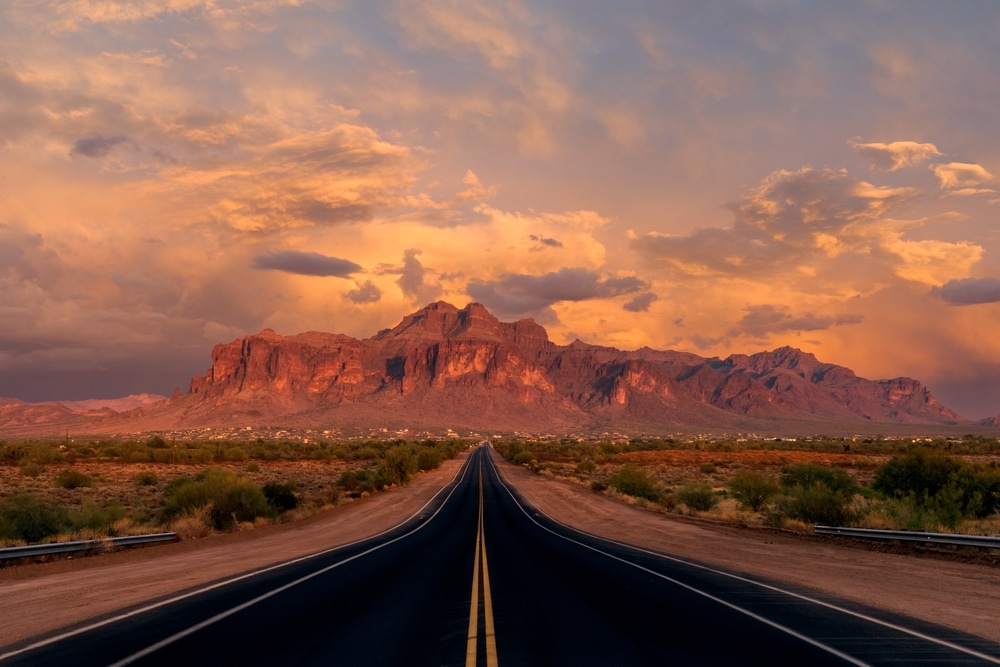 Road to the Superstition Mountains, Arizona at sunset See less